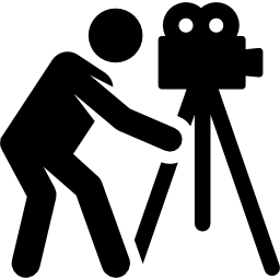 Person standing behind video camera